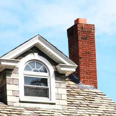 Roof with red brick Chimney